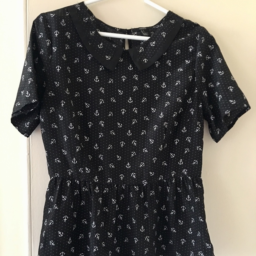 Collared short sleeve blouse with anchor pattern